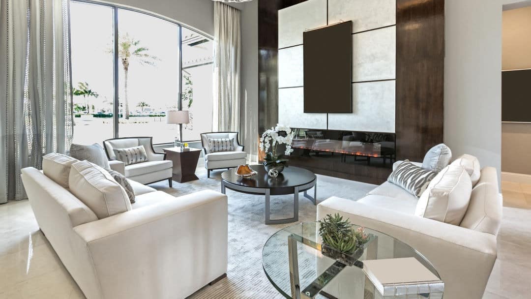 6. Chic Coastal Glamour in Crisp White & Metallic Accents - elegant living room ideas