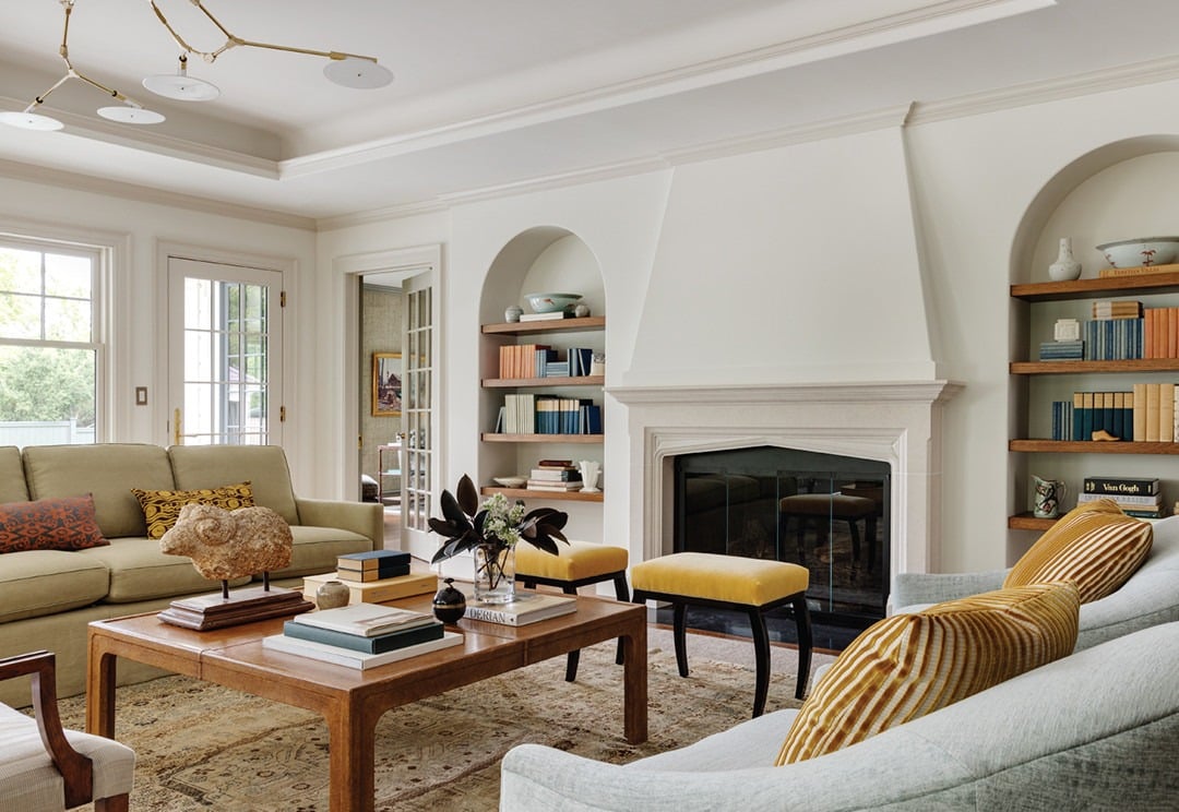 11. Classic Comfort with Soft Greens and Warm Wood Accents - elegant living room ideas