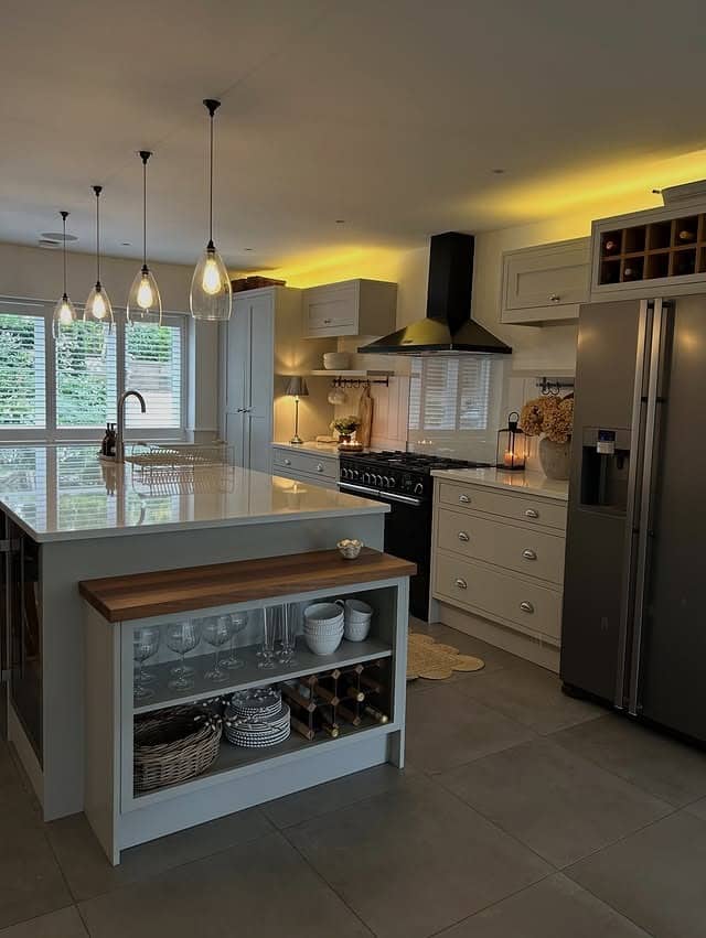 5. Classic Kitchen with Modern Lighting and Open Display Shelving - yellow and grey kitchen ideas