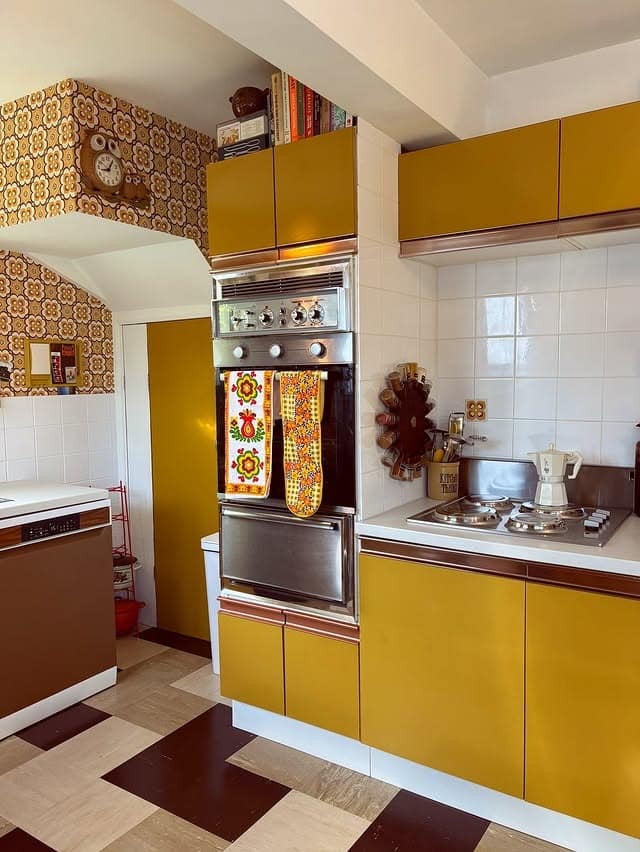 6. Retro Mustard Kitchen with Vintage Charm - yellow and grey kitchen ideas