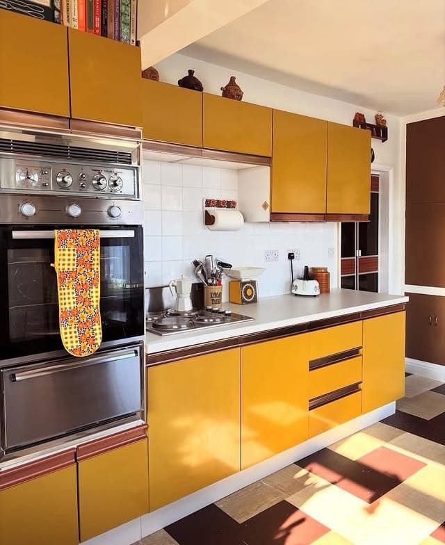 7. Mid-Century Mustard Kitchen with Clean Lines - yellow and grey kitchen ideas