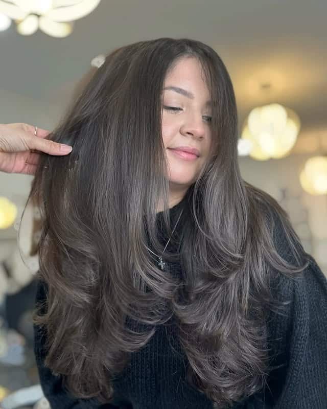 4. Dimensional Brunette Blowout with Cascading Layers - Face-Framing Haircuts