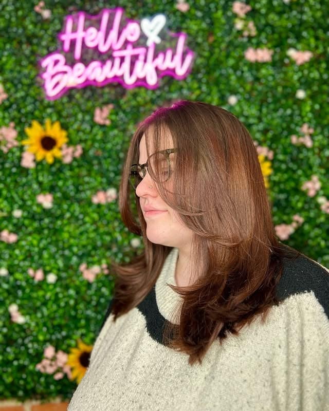 8. Chestnut Layered Cut with Gentle Forward Curve - Face-Framing Haircuts