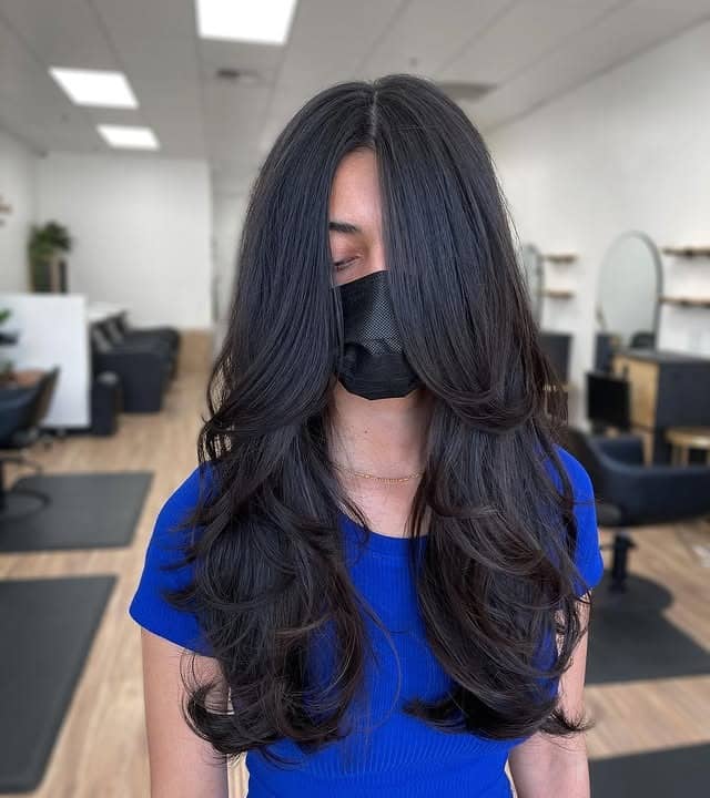 9. Dark Voluminous Layers with Extended Face Frame - Face-Framing Haircuts