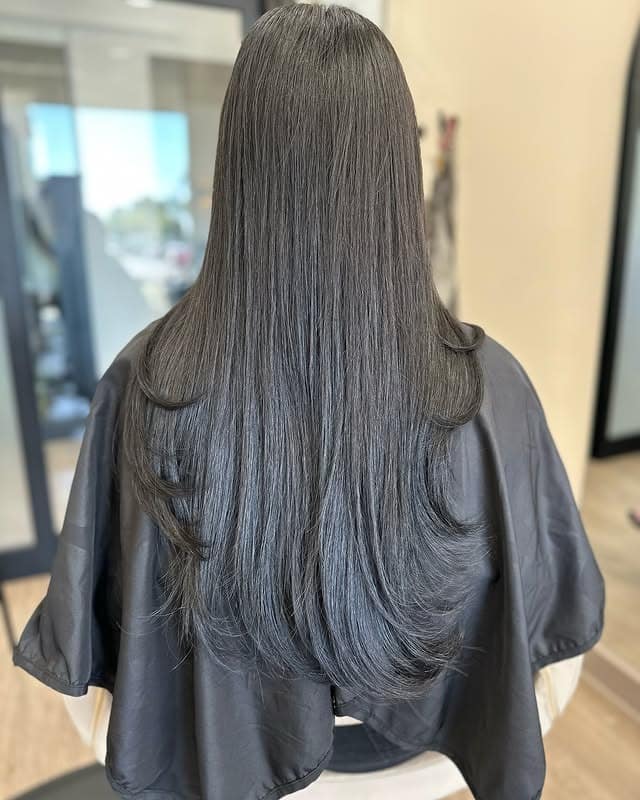 11. Silky Midnight Layers with Soft Face Framing - Face-Framing Haircuts