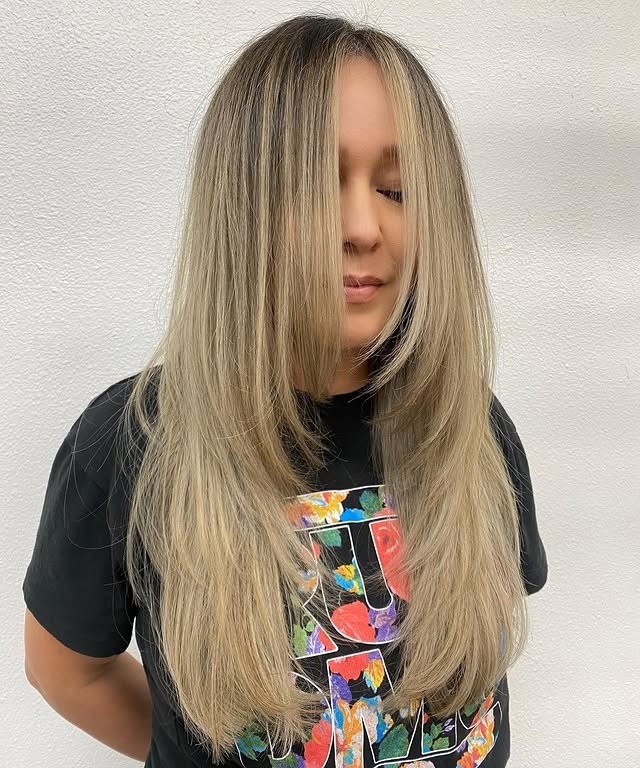 13. Rooted Champagne Layers with Elongated Face Frame - Face-Framing Haircuts