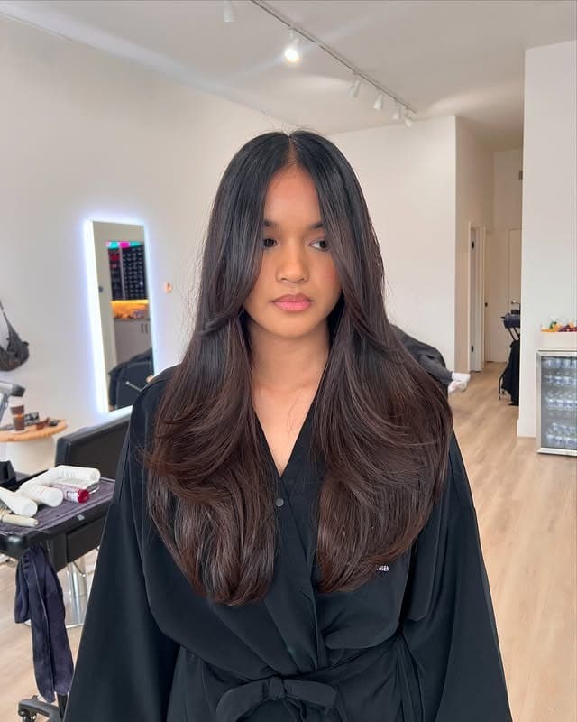 21. Deep Espresso Layers with Soft Curtain Framing - Face-Framing Haircuts