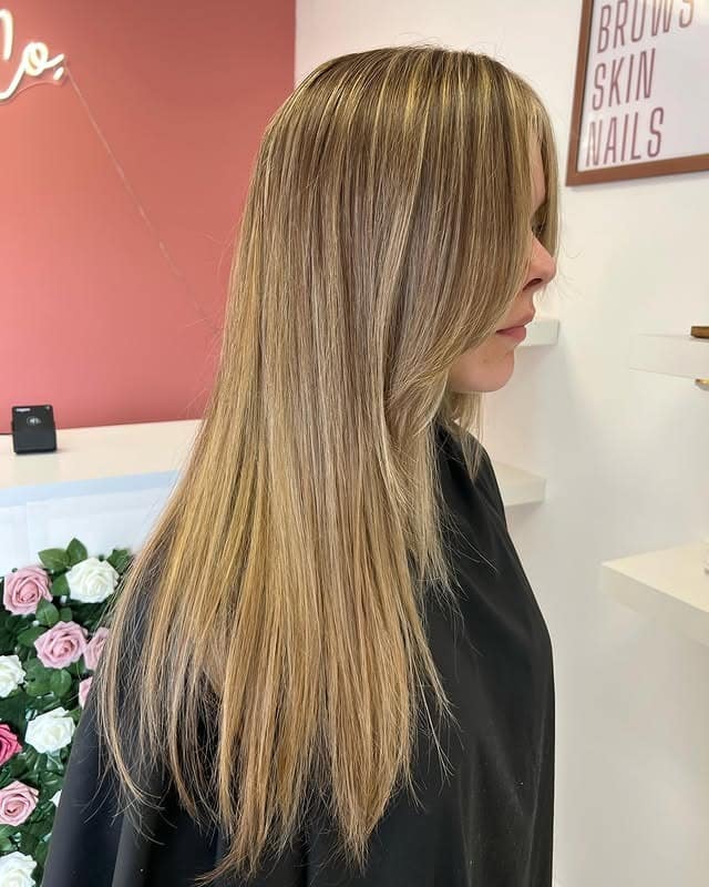 22. Golden Blonde Straight Layers with Elongated Face Frame - Face-Framing Haircuts