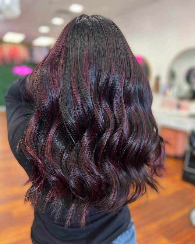 10. Crimson Balayage Waves With High-Shine Finish - Burgundy Balayage Hair Color