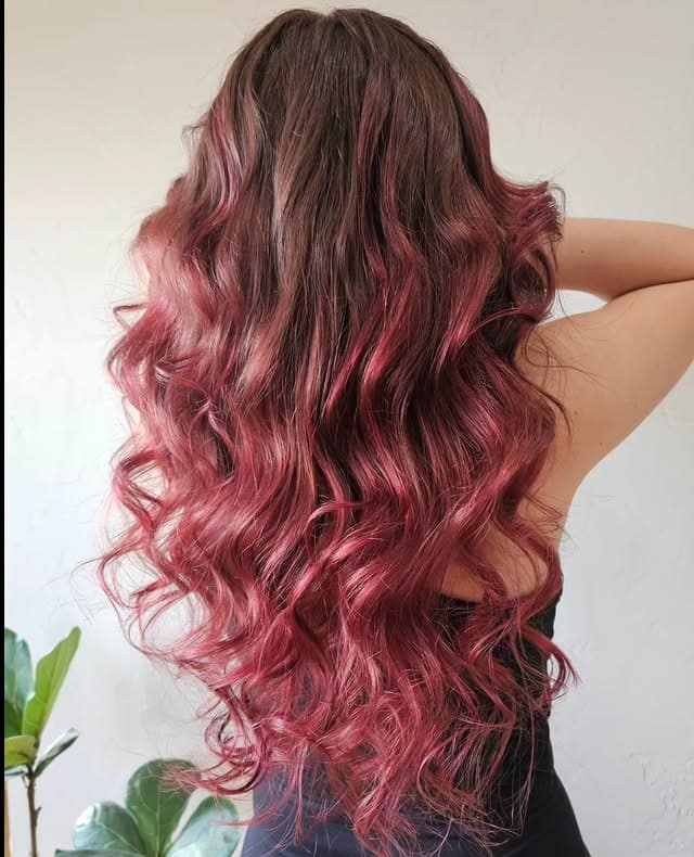 12. Rosy Burgundy Gradient With Voluminous Curls - Burgundy Balayage Hair Color