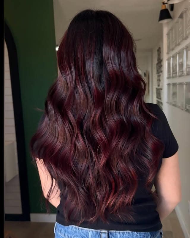 22. Crimson-Burgundy Balayage With Sculpted Long Waves - Burgundy Balayage Hair Color