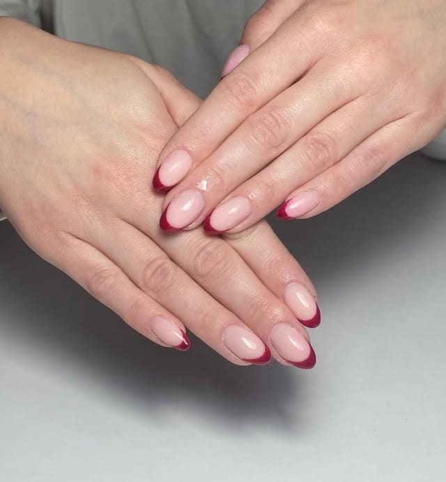 3. Berry-Tipped French Almond Nails - fall french nail ideas