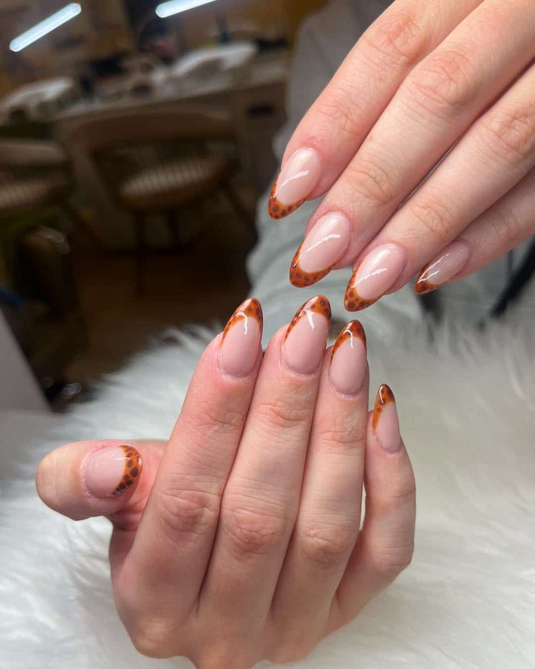 16. Soft Leopard French Almond Nails - fall french nail ideas