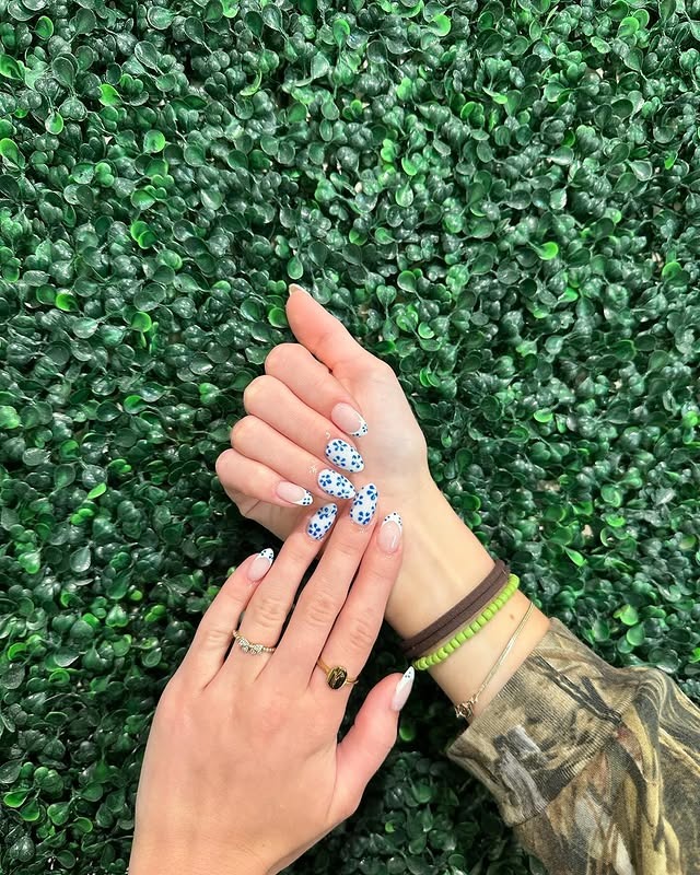 13. Sky Blue Speckled Blossom Dip Nails - flower dip nail ideas