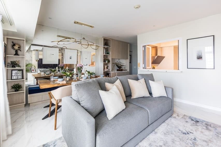 13. Grid Mirror Wall in Charcoal and Monochrome Accents - mirrors in living room ideas