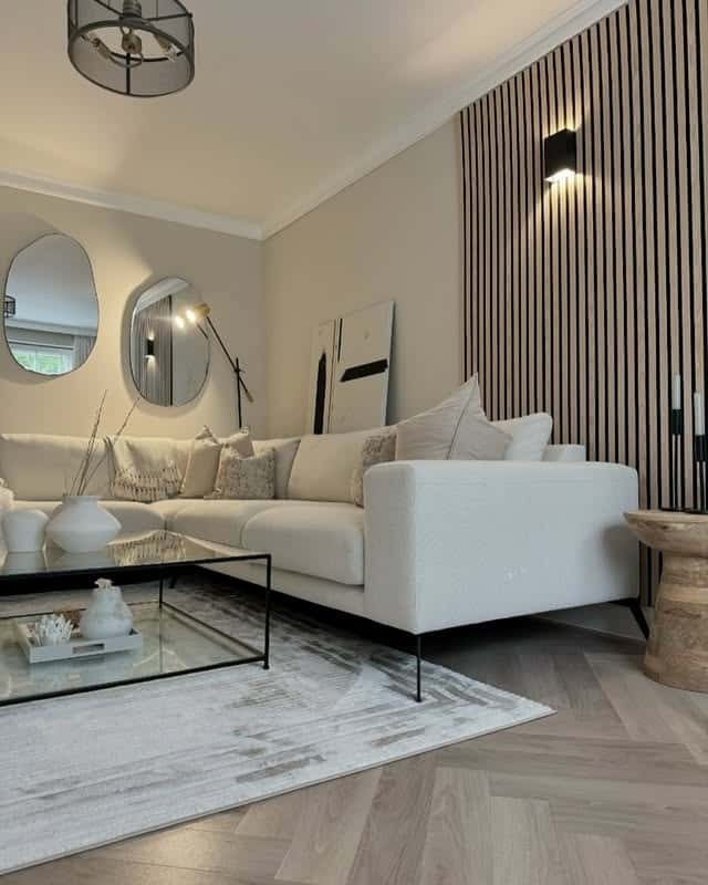 15. Organic Statement Mirror Arrangement in Taupe and Gold - mirrors in living room ideas