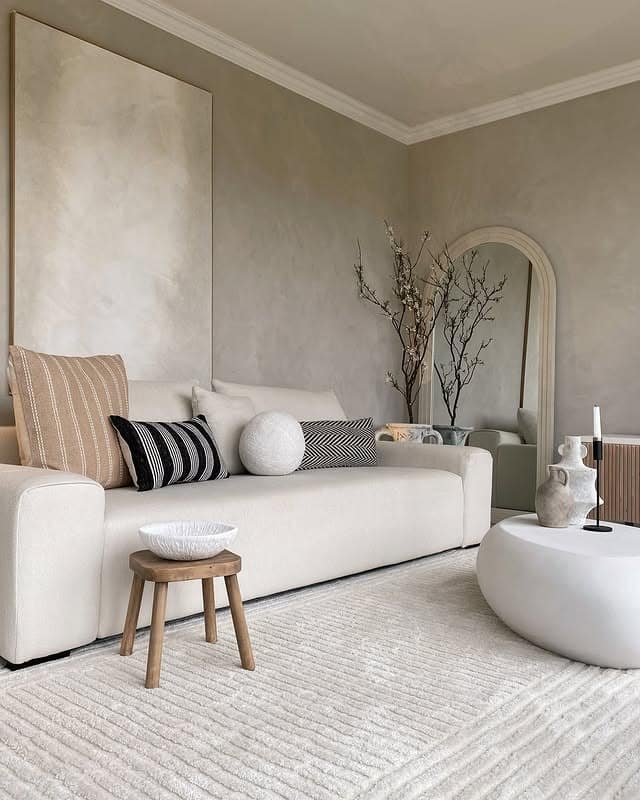 16. Clustered Circle Mirrors in Brushed Gold and Powder Blue - mirrors in living room ideas