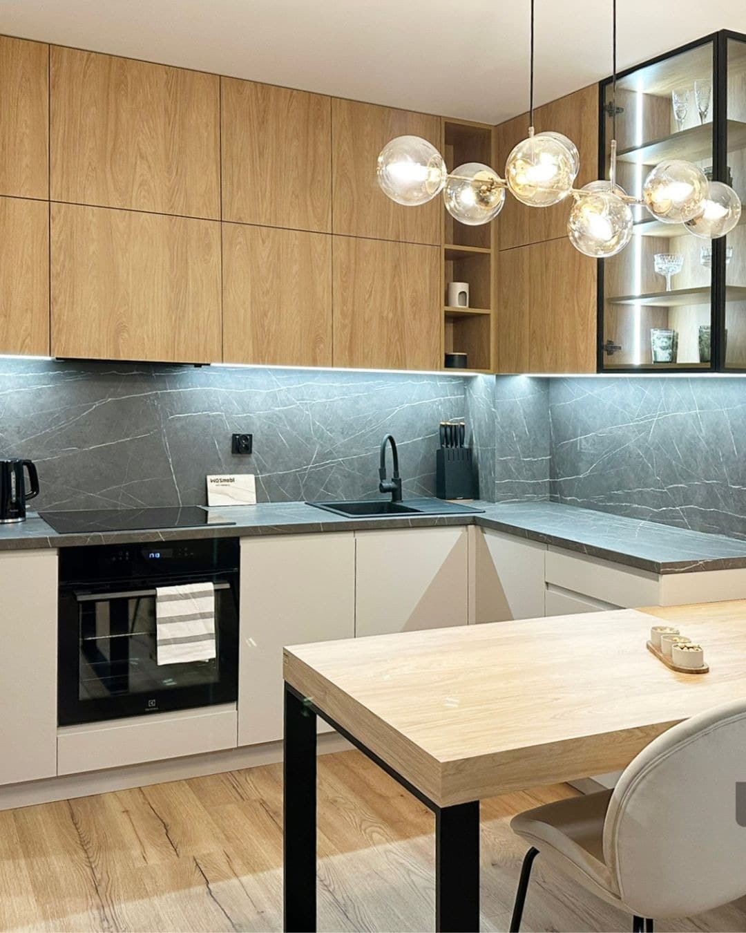 9. Gray and Wood Contrast with Stone Backsplash - light gray kitchen ideas