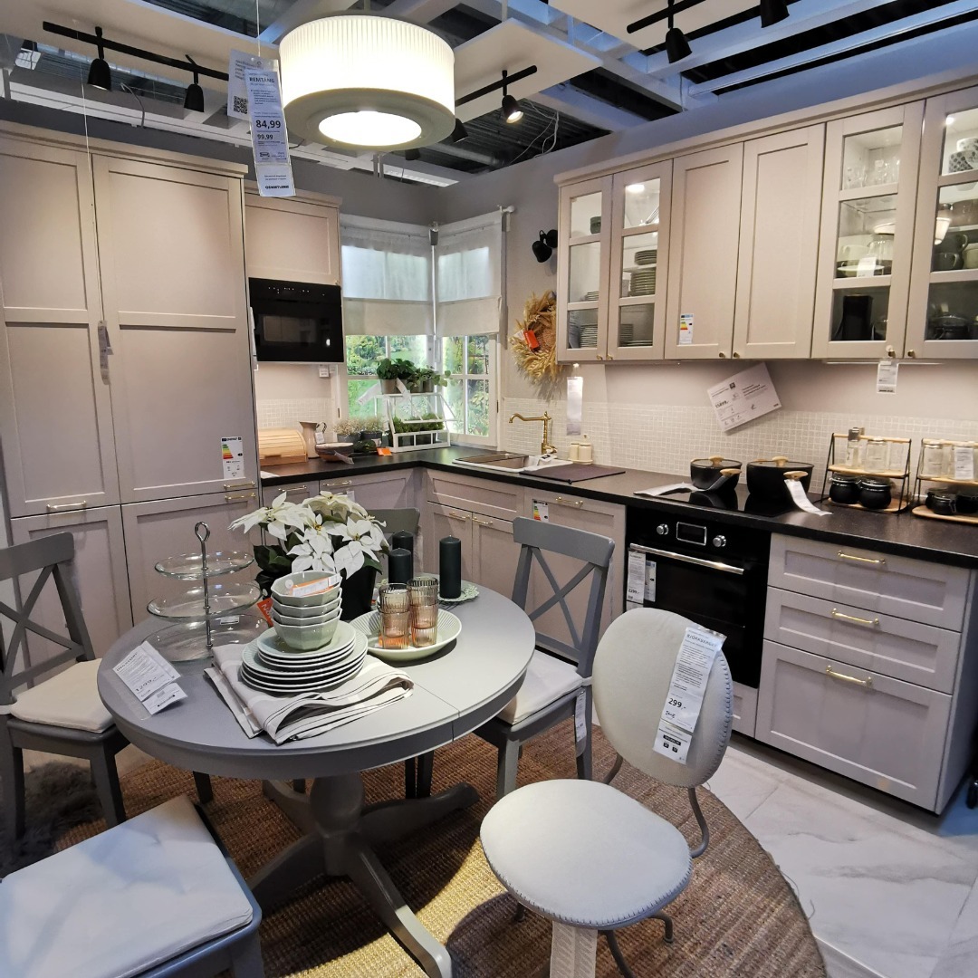 15. Warm Light Gray Kitchen with Cozy Eating Nook - light gray kitchen ideas