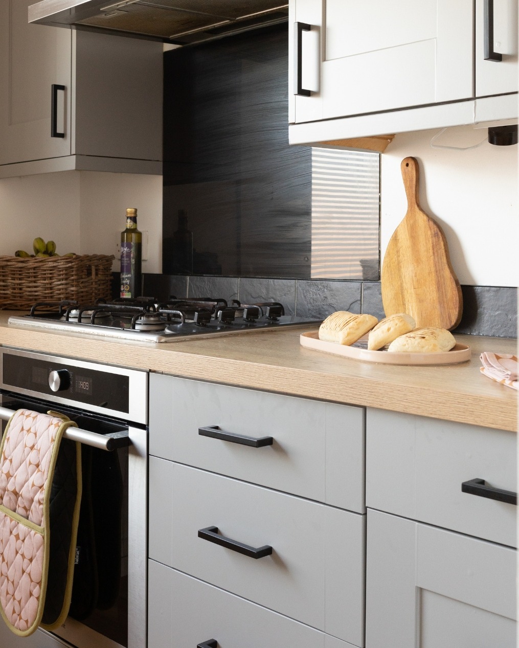 18. Matte Light Gray Cabinets with Natural Wood Counters - light gray kitchen ideas