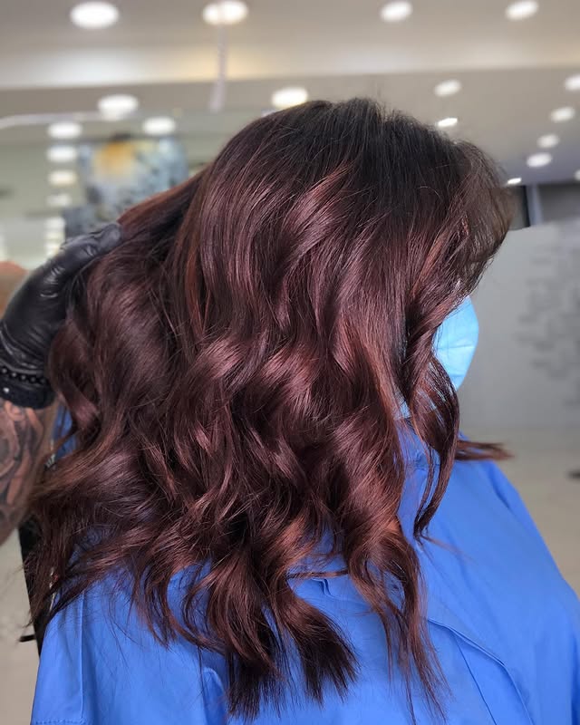 7. Textured Mahogany Brown Mid-Length Waves - Mahogany Hair Color