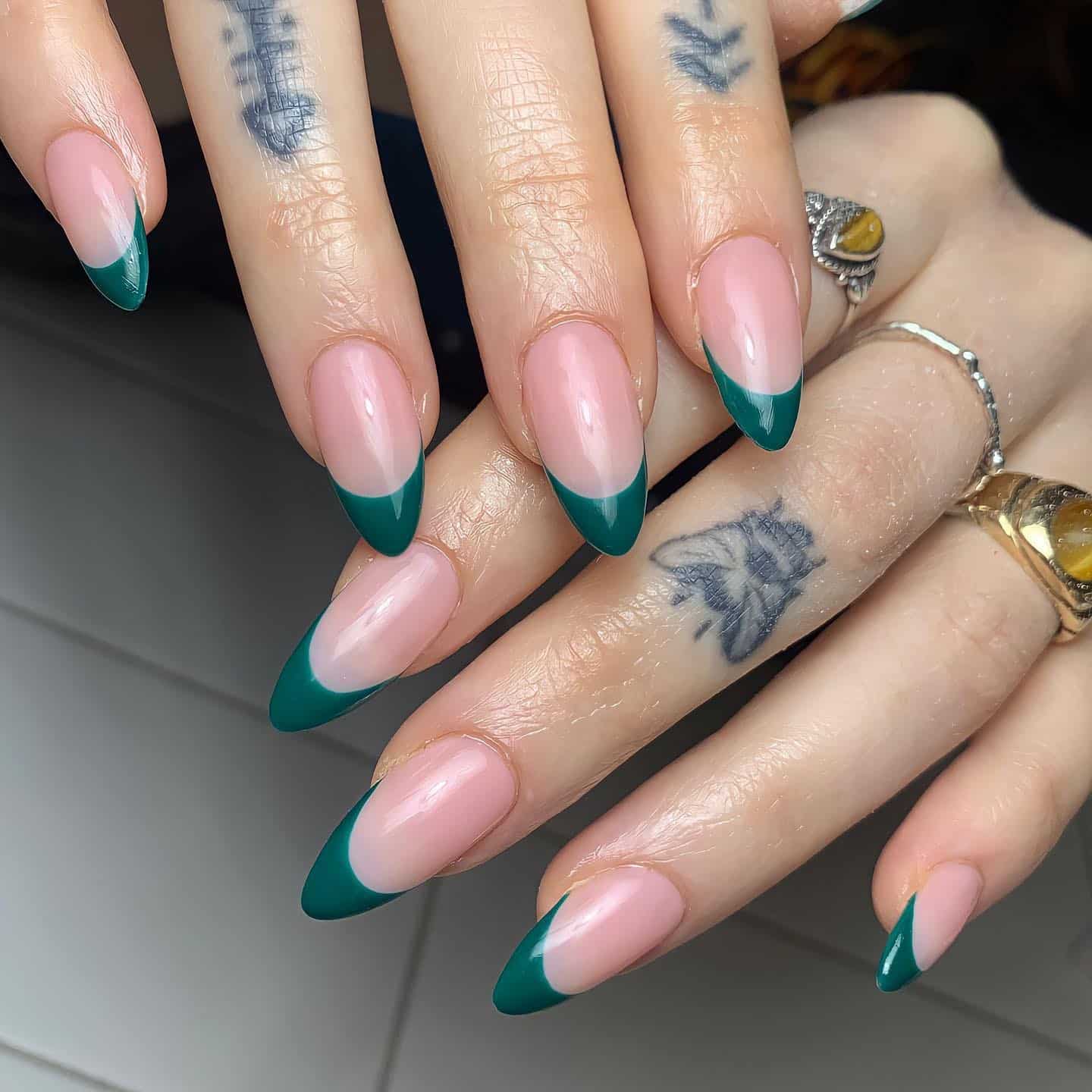 2. Emerald Tip French – Almond Nails - forest green nail ideas