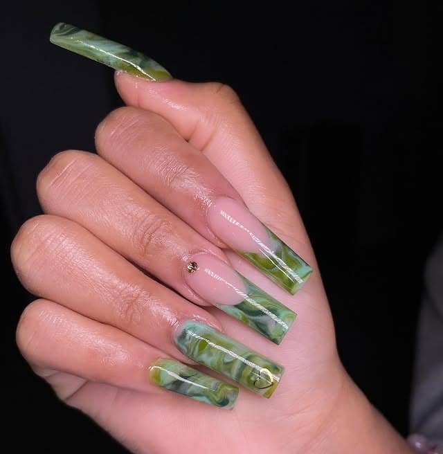 5. Green Marble Elegance – Long Coffins - forest green nail ideas
