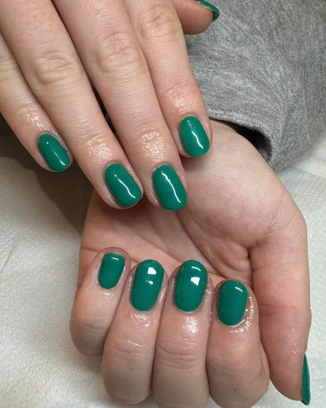 10. Woodland Green Sheen – Short Rounds - forest green nail ideas