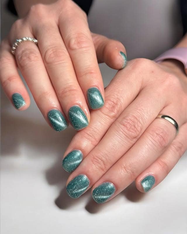 12. Soft Shimmer Pine – Rounded Nails - forest green nail ideas