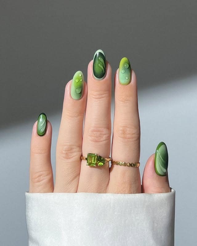 13. Layered Green Dimension – Almond Nails - forest green nail ideas