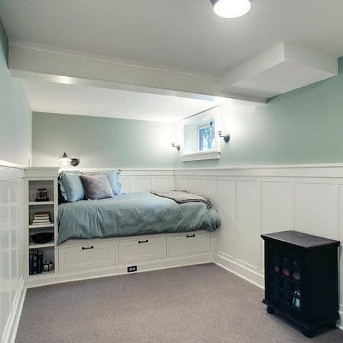 19. Built-In Bed Nook with Soft Green Walls - basement bedroom ideas
