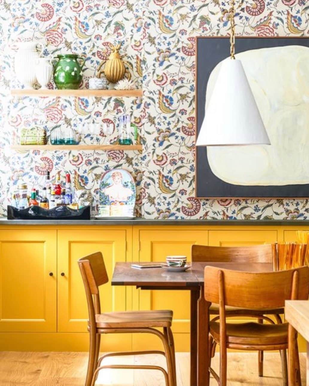 3. Patterned Dining Nook With Sunshine Yellow Lower Cabinets - yellow kitchen ideas