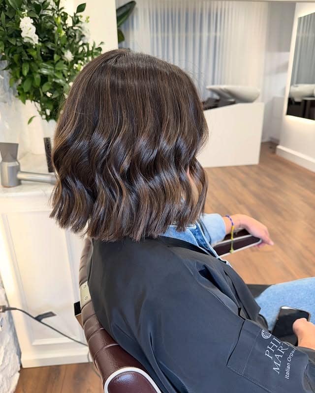 17. Dark Chocolate Wavy Lob With Subtle Highlights - Lob Hairstyles