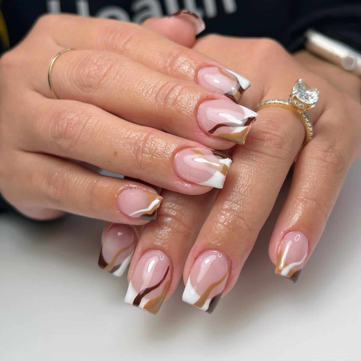 13. Marbled Fall French With Warm Swirls - french tip fall nail ideas