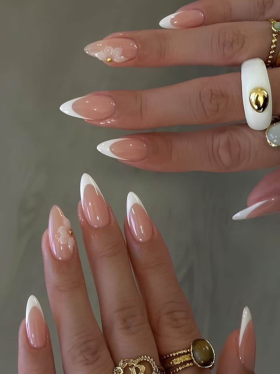 17. White Sculpted Petal French With Floral Accents - french tip fall nail ideas
