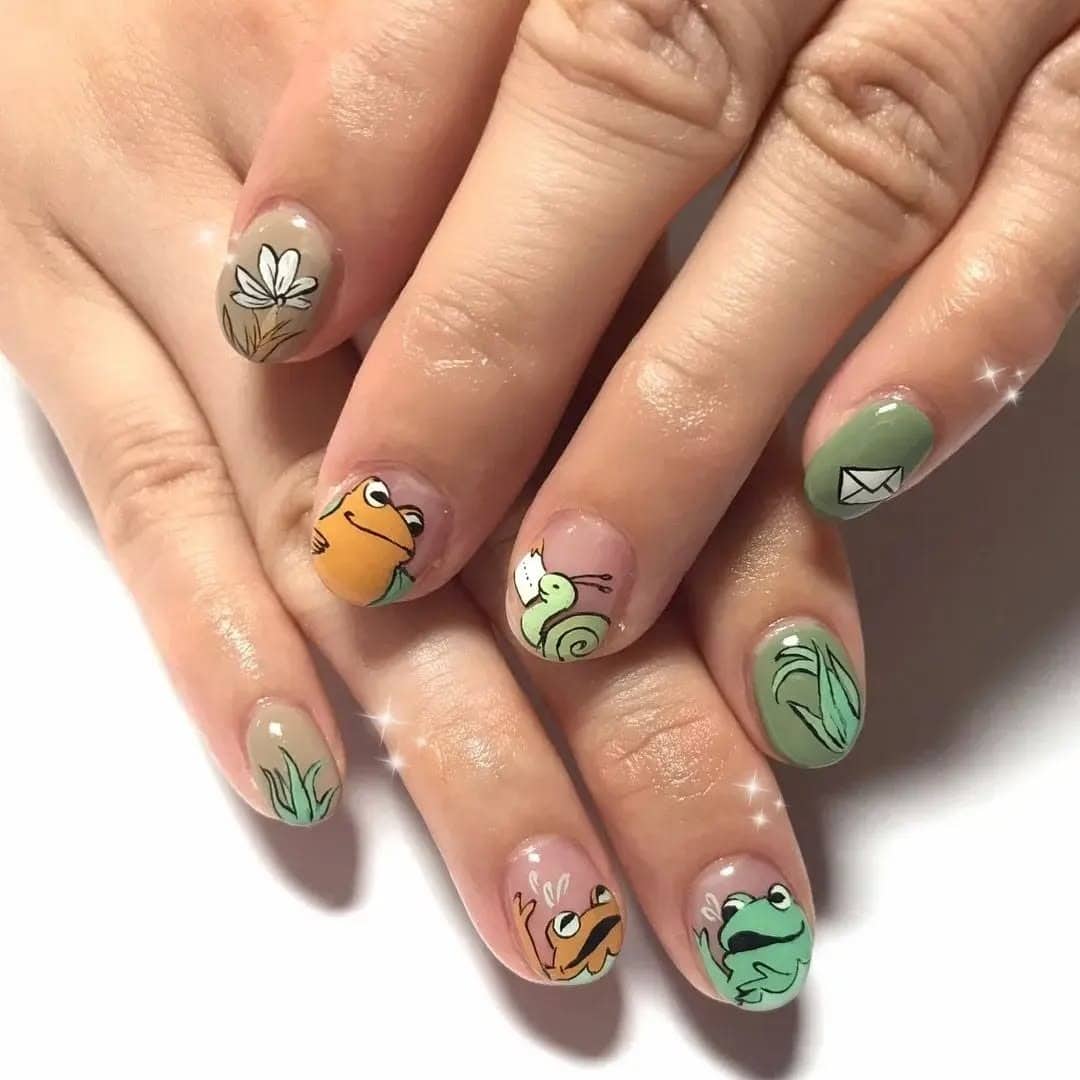 10. Storybook Frog & Snail Nails - frog nail ideas