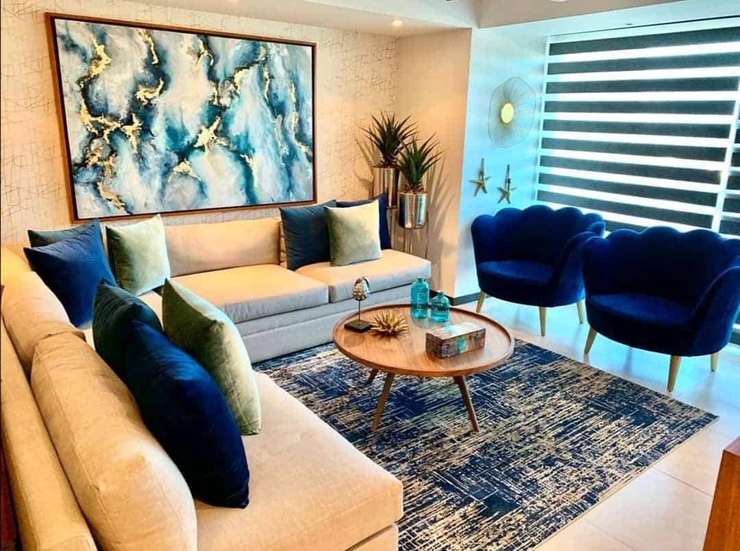 18. Coastal-Inspired Neutrals with Royal Blue Accent Chairs - royal blue living room ideas