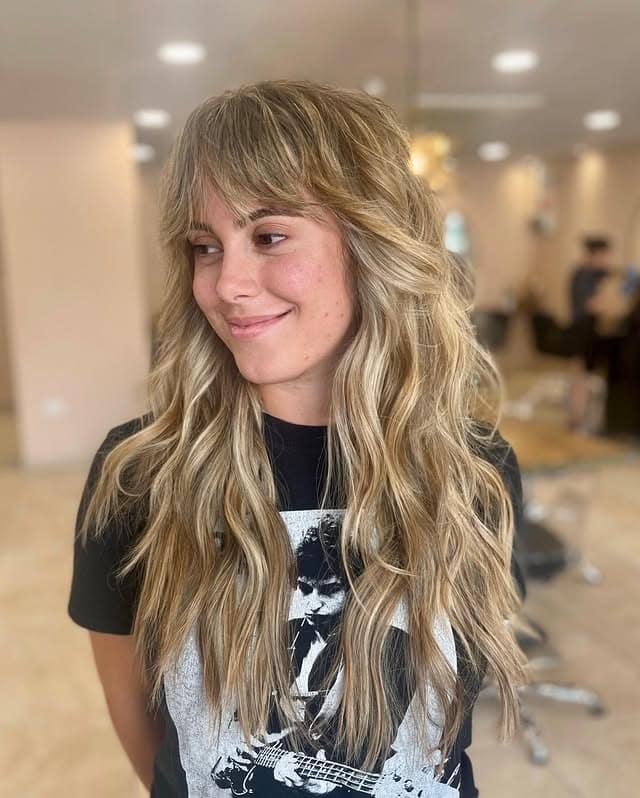 2. Long Blonde Shag with Feathered Fringe - Shaggy Haircut