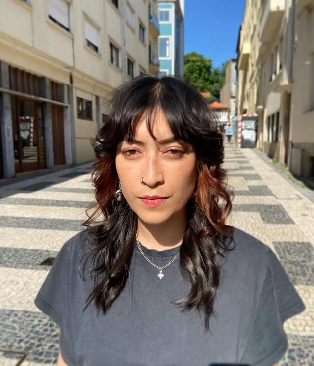 3. Dark Shag with Rust-Tone Accents - Shaggy Haircut