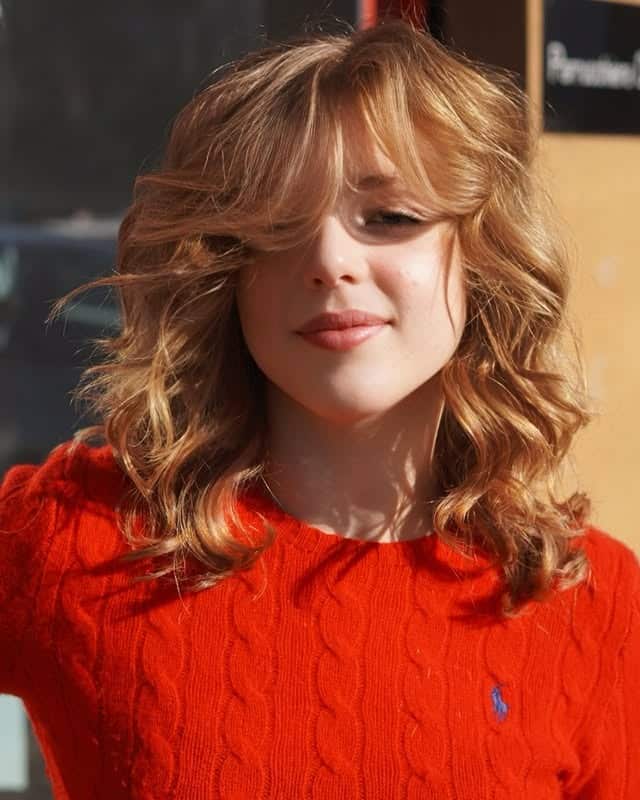 4. Golden Curl Shag with Curtain Fringe - Shaggy Haircut