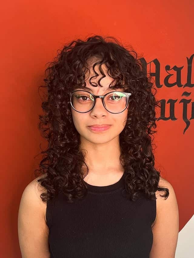 5. Curly Shag with Micro Fringe - Shaggy Haircut