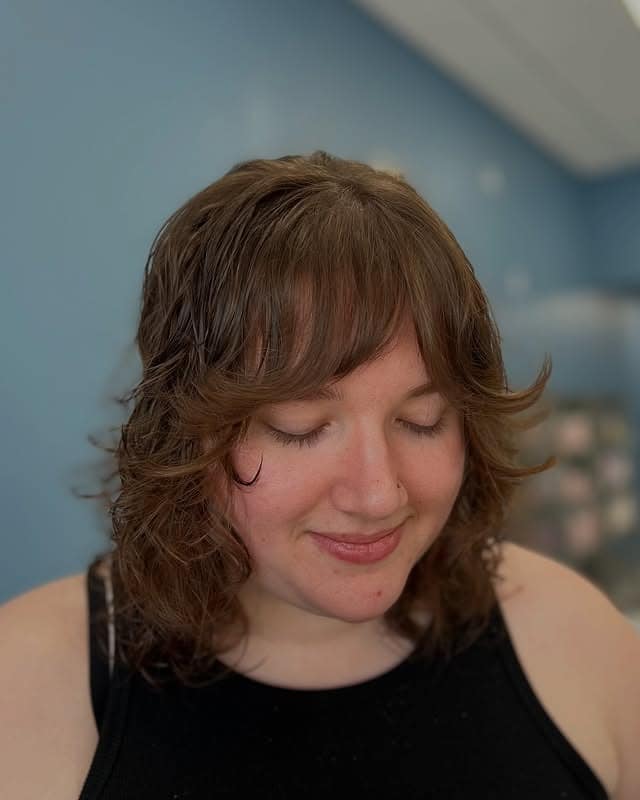 17. Short Curly Shag with Rounded Fringe - Shaggy Haircut
