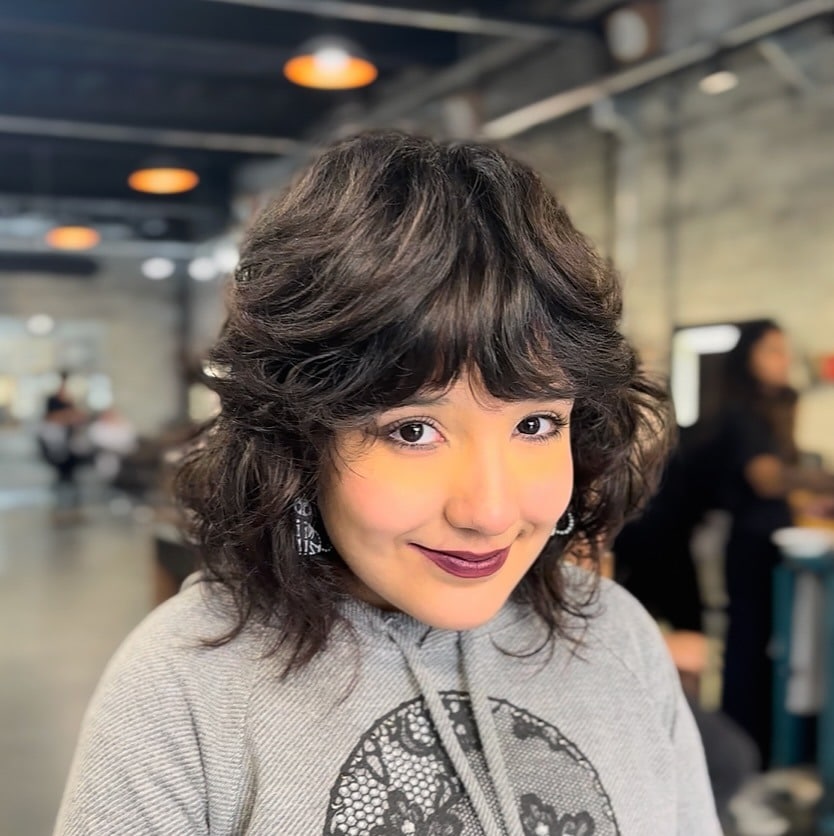 20. Textured Dark Shag with Rounded Micro Bangs - Shaggy Haircut