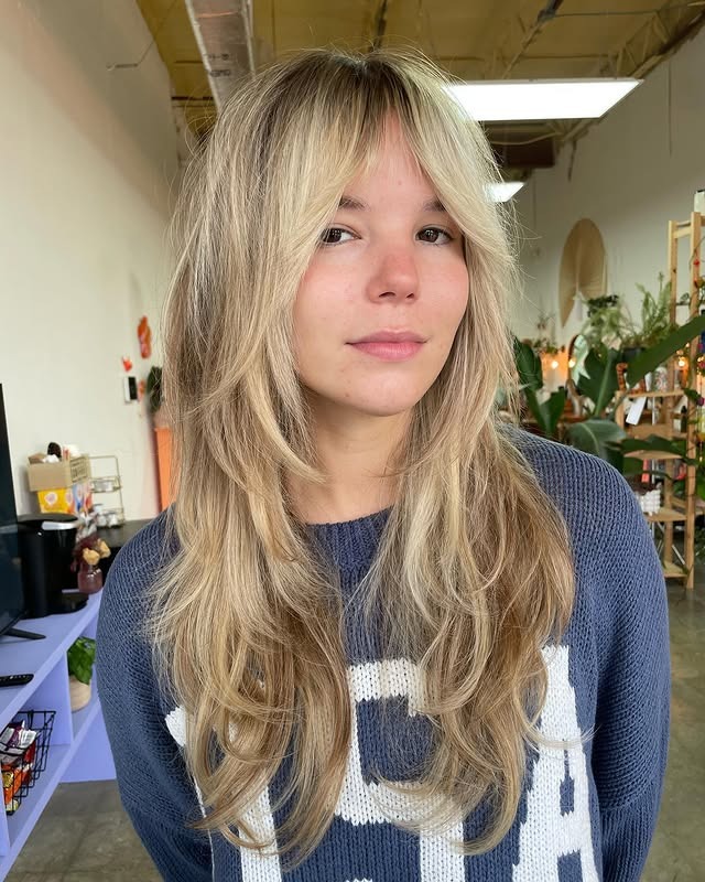 22. Soft Blonde Layered Shag with Curtain Fringe - Shaggy Haircut
