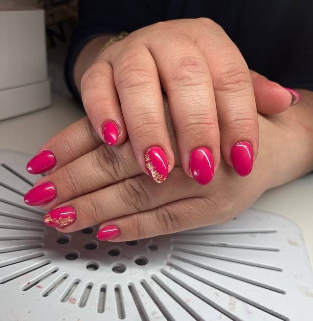 1. Fuchsia Glow Nails with Gold Accent Flecks - fuchsia nail ideas