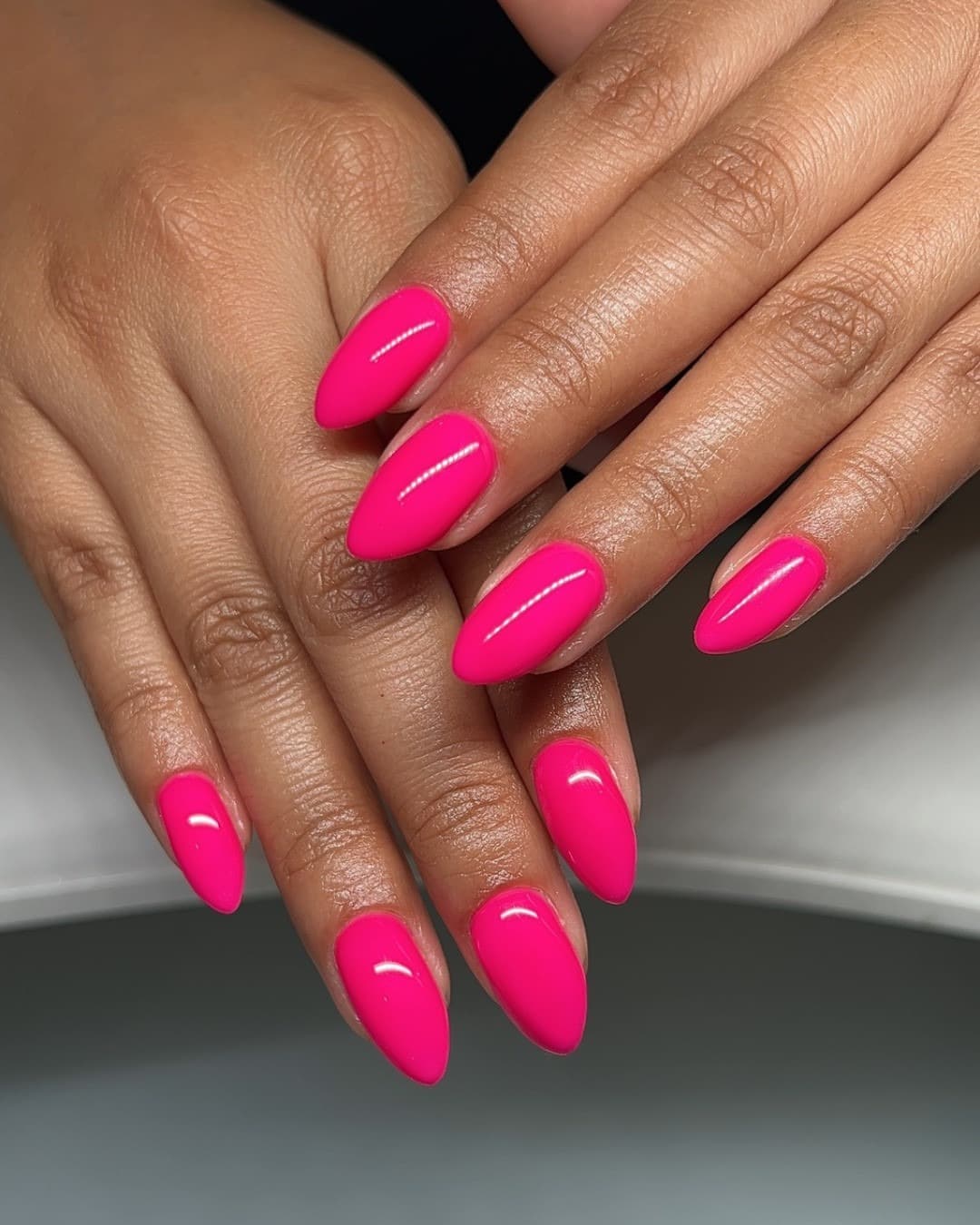 8. Neon-Fuchsia Almond Nails with a Smooth Silky Finish - fuchsia nail ideas