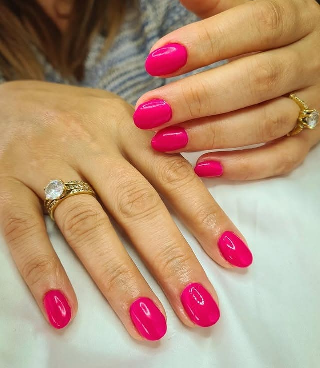 13. Vivid Fuchsia Oval Nails with Bright Shine - fuchsia nail ideas