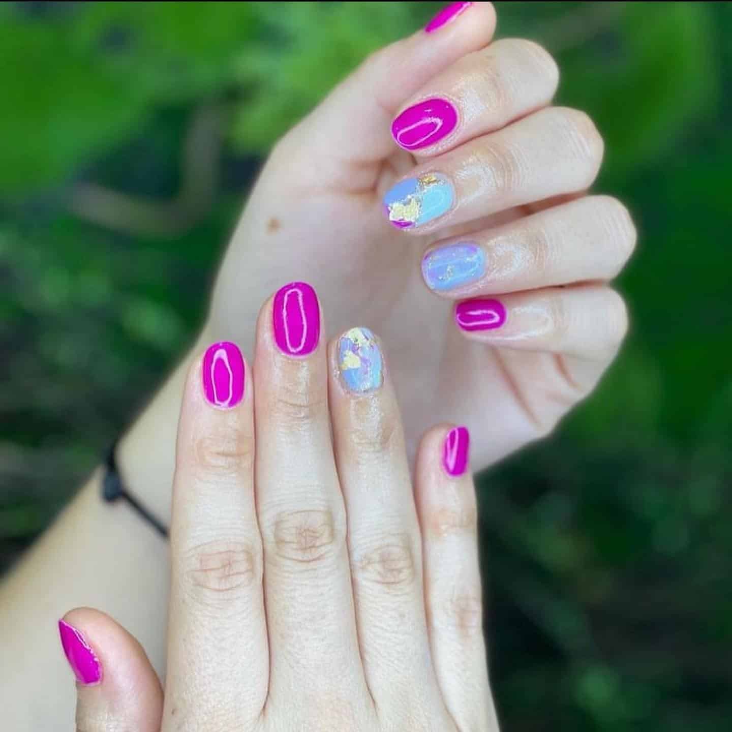 18. Fuchsia Nails with Blue Marble Accent and Gold Foil - fuchsia nail ideas