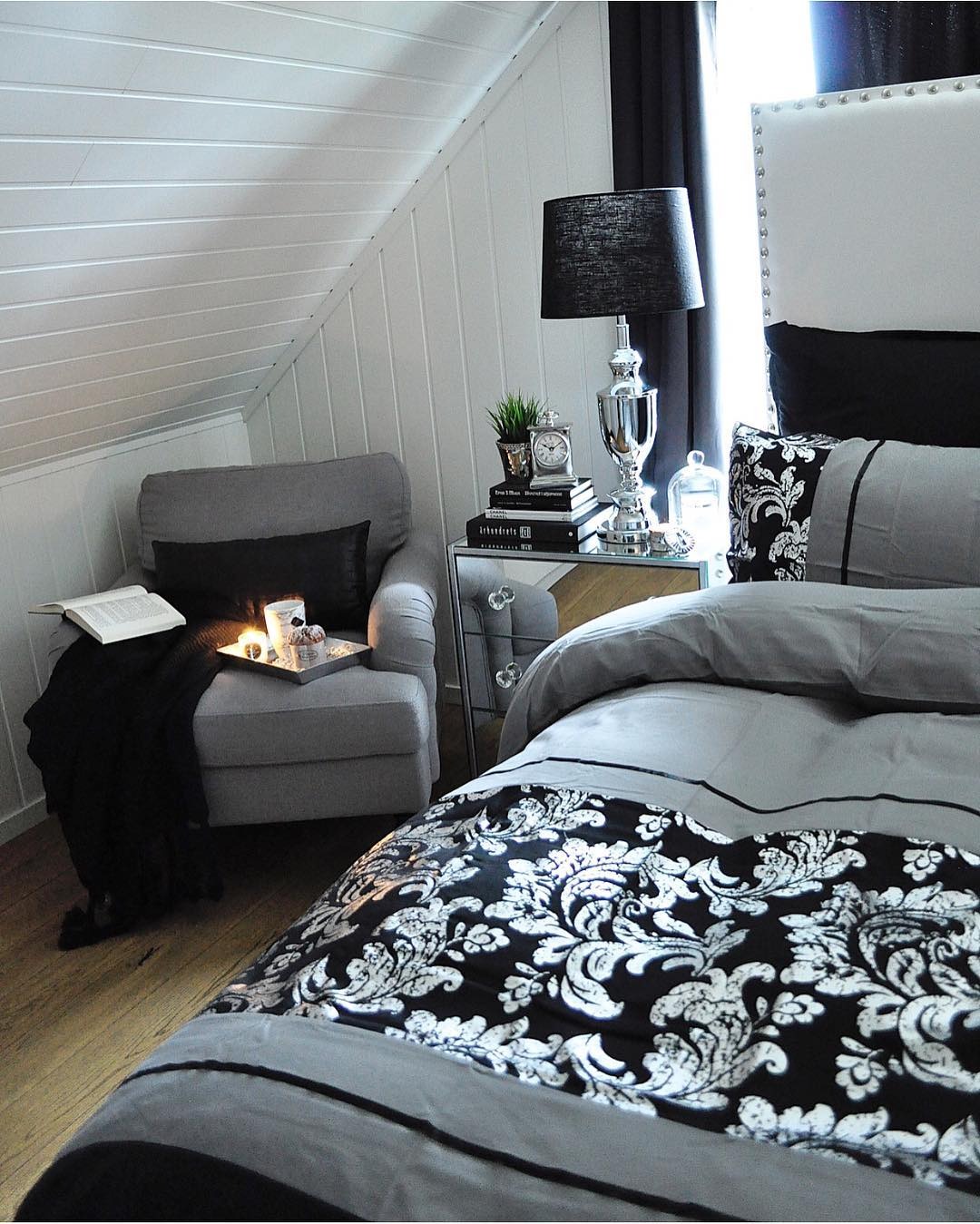 6. Cozy Grey Hideaway With Chrome Accents - grey, black and white bedroom ideas