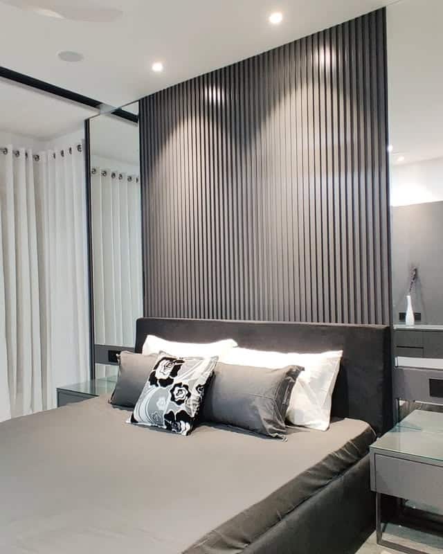 11. Sleek Charcoal Feature Wall Bedroom - grey, black and white bedroom ideas